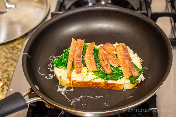 Breakfast grilled cheese layers with Gouda, spinach and bacon