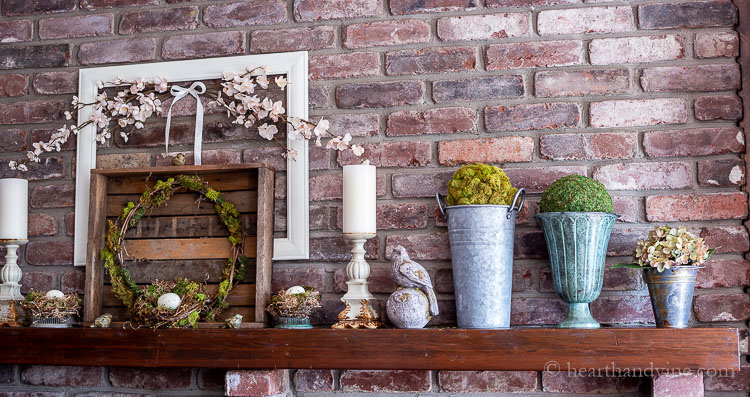 Right side of spring mantel with natural decorations