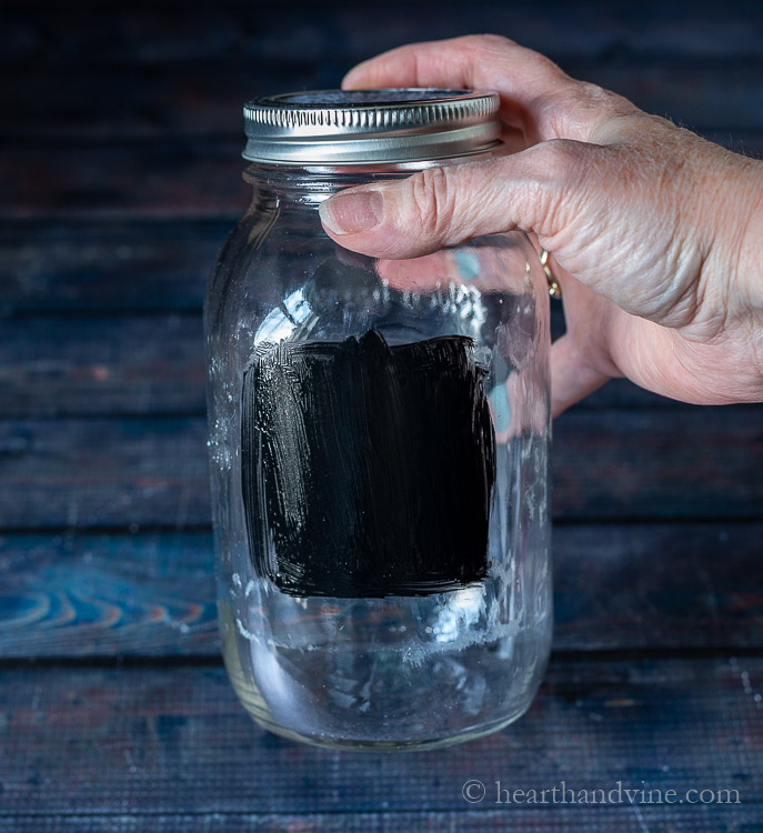 Black paint on mason jar side