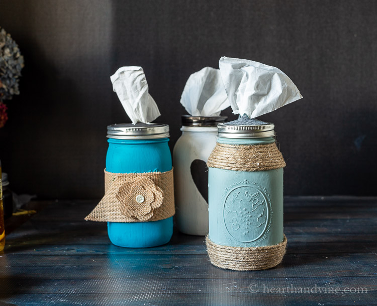 three mason jar tissue holders