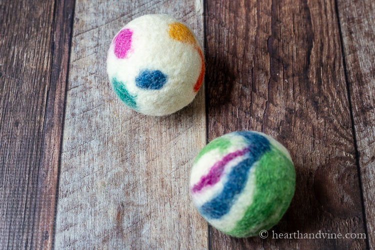 Two colored wood dryer balls