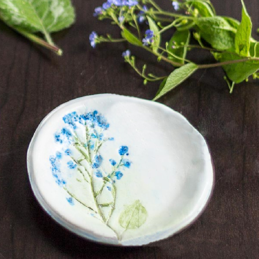 Blue flower pressed jewelry dish.
