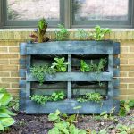 diy pallet garden in front of house