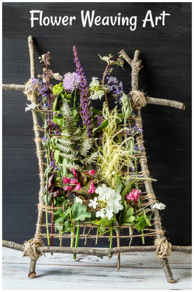 Flowers weaved into twig and twine frame.