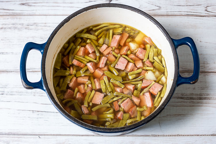 Large pot of ham and green bean soup.