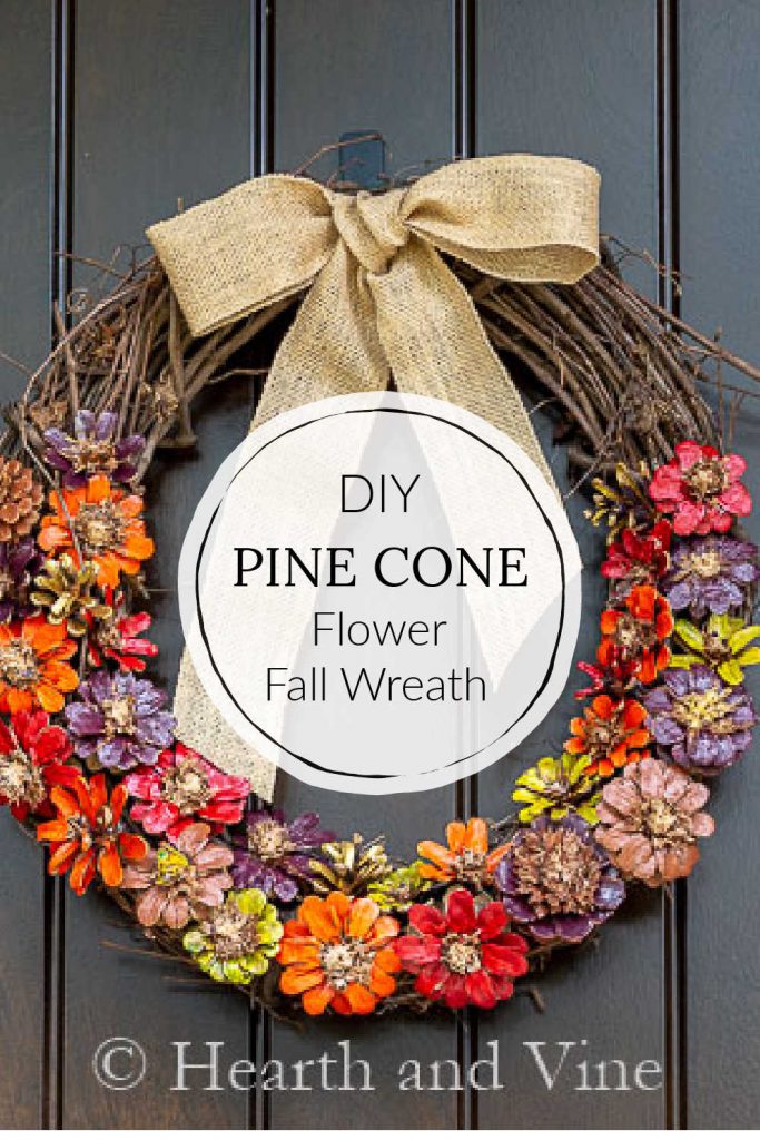 Flower pine cones painted in fall colors and glued to a grapevine wreath with a burlap bow.