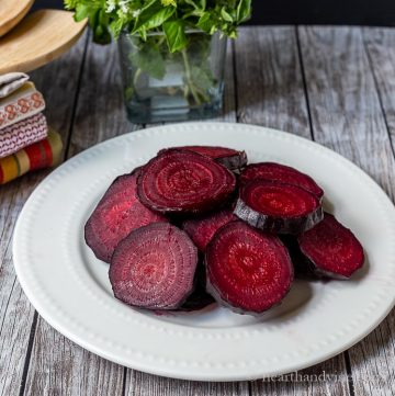 Plate of sliced roasted red beets.