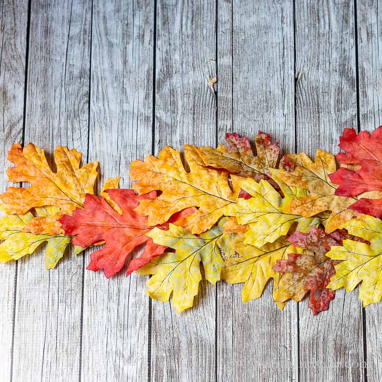 Faux fall leave table runner partial view.