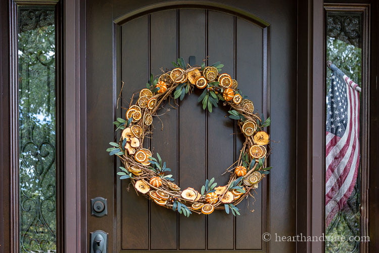 Dried fruit wreath on front door.