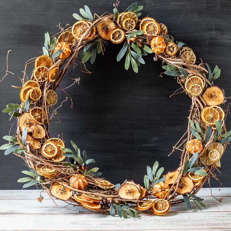 Dried fruit wreath sitting on a table.