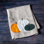 Linen towel with pumpkin applique