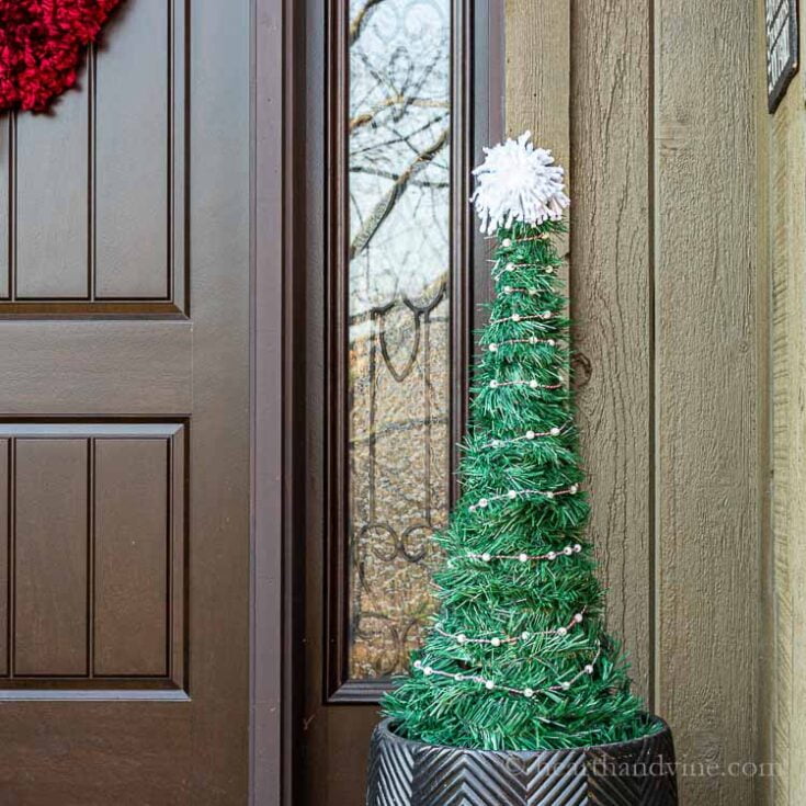 How To Make Faux Christmas Tree Planters For Your Front Porch - Diy Outdoor Christmas Decorations Dollar Tree