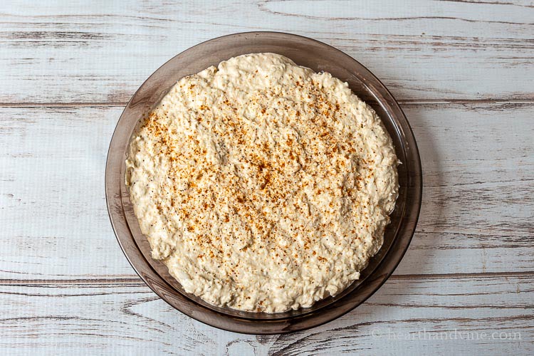 Maryland crab dip in baking pan before going into the oven.