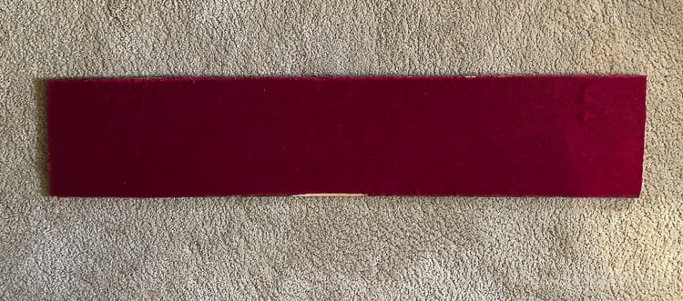 Red flannel fabric glued to the back of the boards.