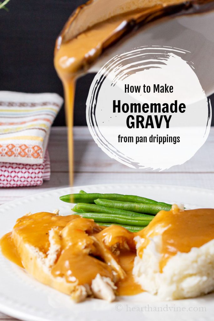 Plate of green beans, chicken and mashed potatoes with gravy. Above a gravy boat is pouring gravy onto the chicken.