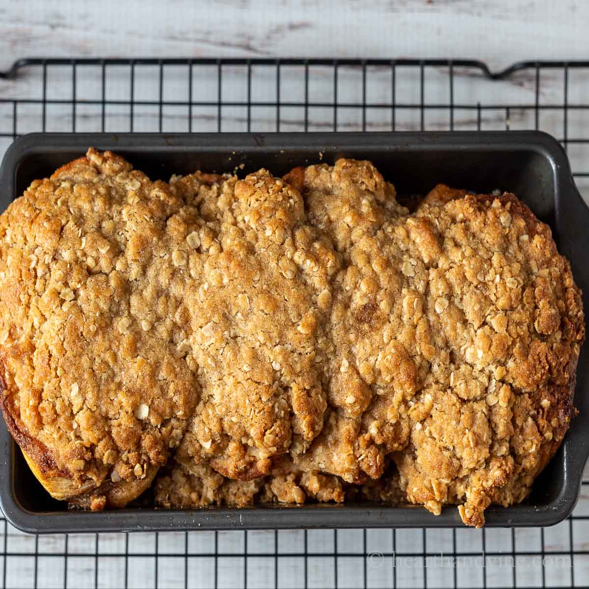 Cinnamon toast crunch bread on a cooling rack