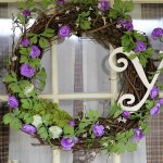 Spring grapevine wreath with florals and a Y monogram.