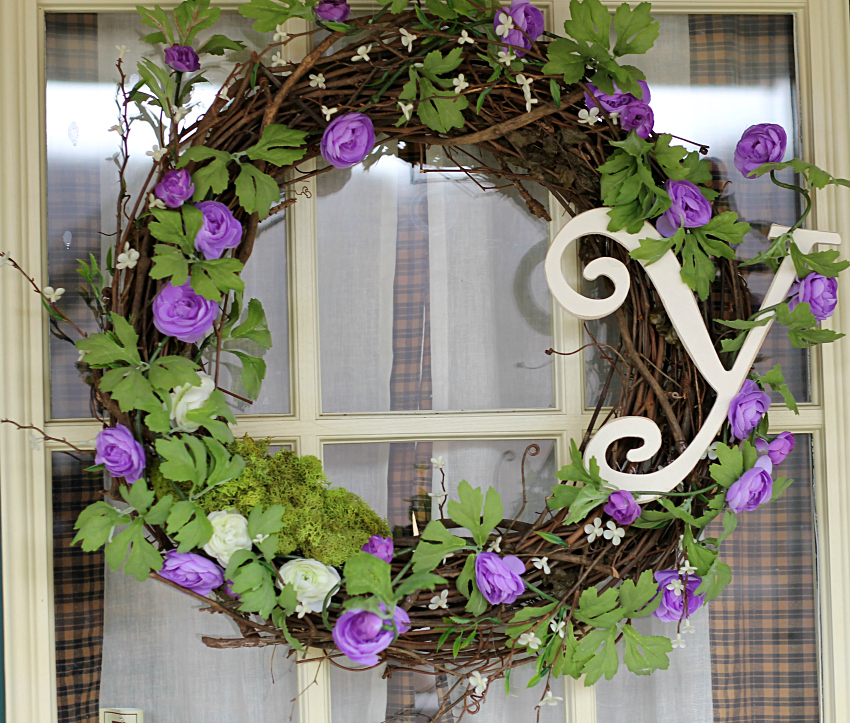 Spring wreath with lavender flower garland and white letter Y.