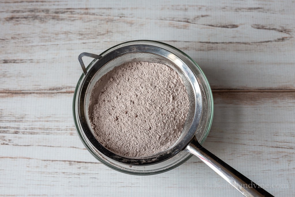 Hot chocolate mix in a sifter.