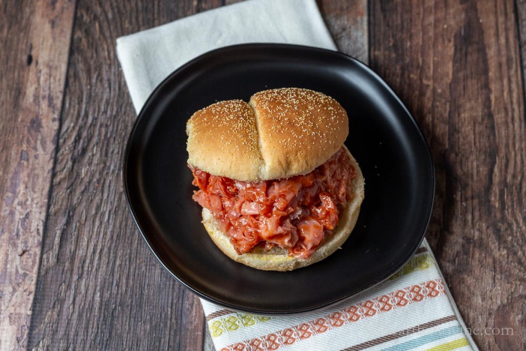 Ham barbecue sandwich on a plate.