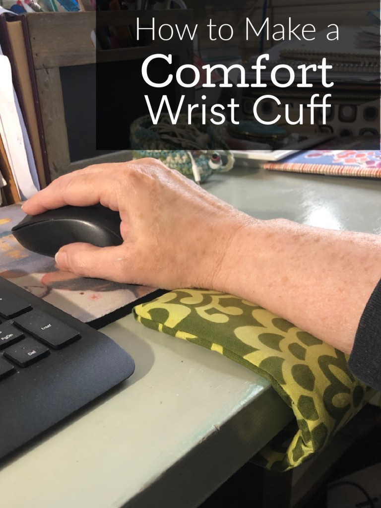 Wrist cuff on desk with arm resting while using a computer mouse.