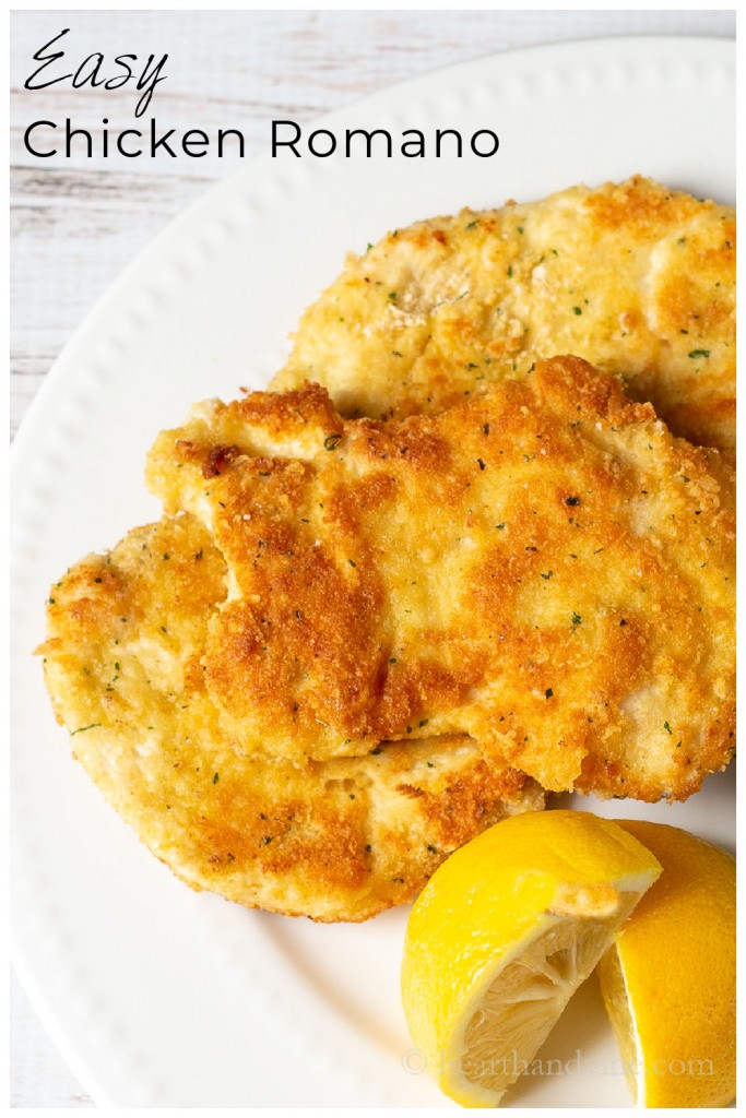 Chicken Romano cutlets with lemon wedges on a plate.