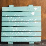 Wood shim welcome sign in aqua and white