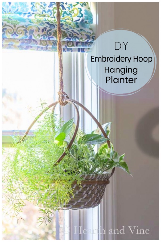 Ferns and pothos in a hanging basket planter with embroidery hoops.