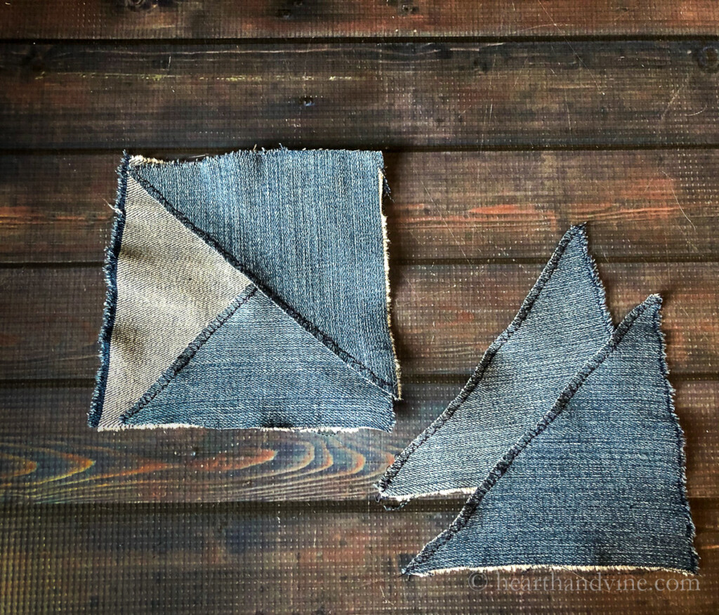 Two denim triangles over-lapped on a denim square. Two additional triangles on the right.