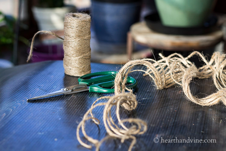 Twine and scissors on a table.