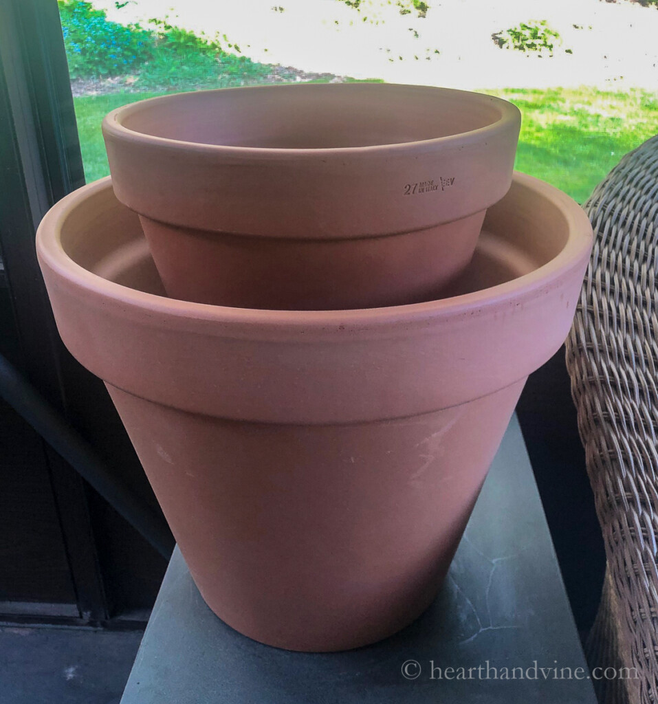 Two clay pots stacked together.
