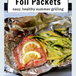 Salmon filet and julienne vegetables on foil