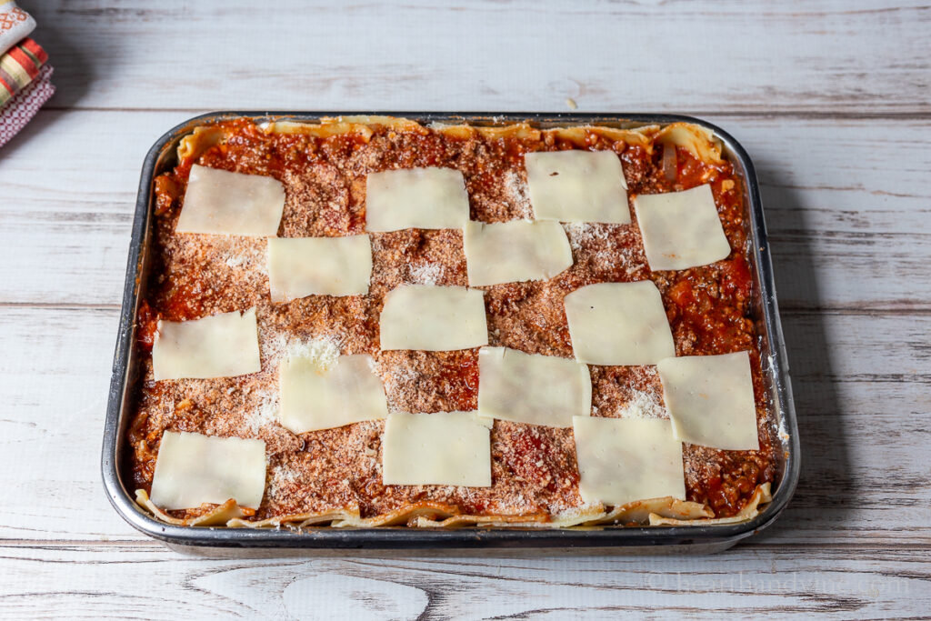 Lasagna recipe in a large pan before baking.