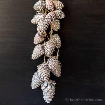 Garland of faux bleach pinecones