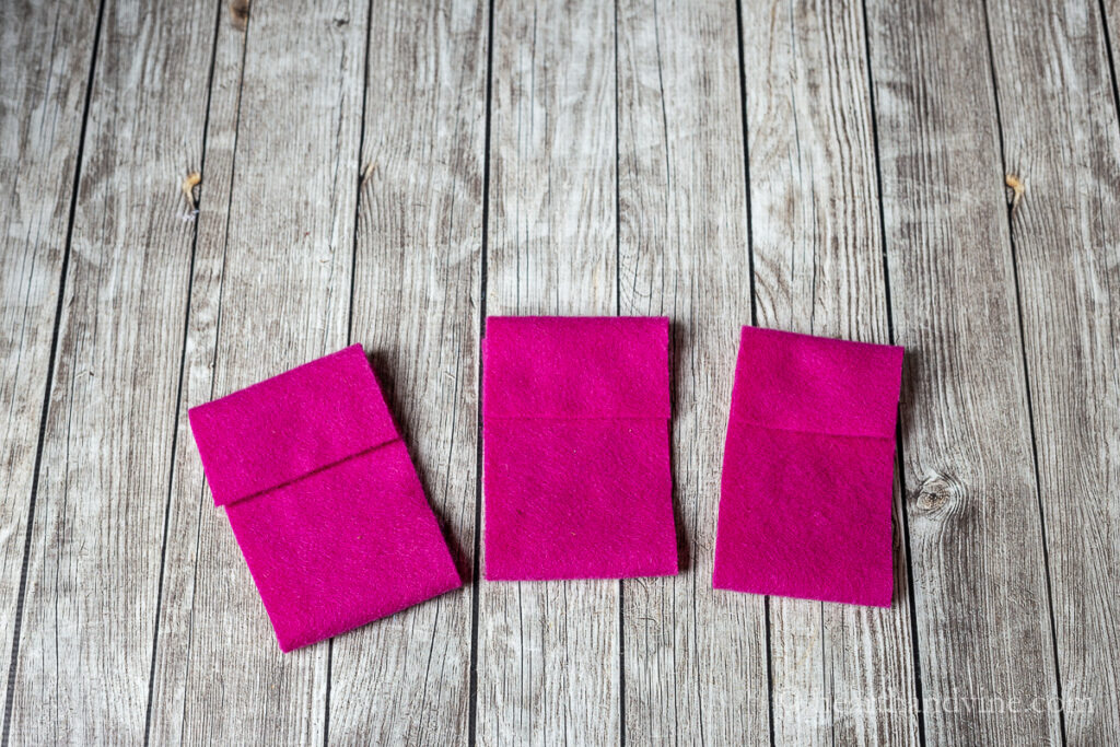 A piece of felt folded and cut into three sections.