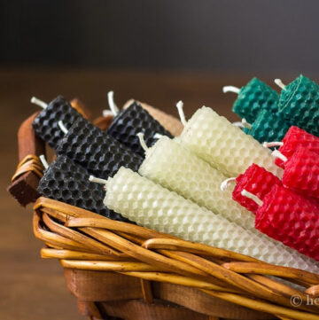 Basket of rolled beeswax candles.
