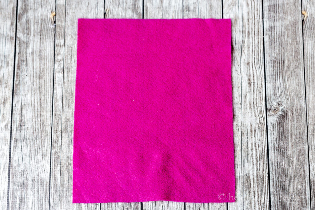 A 9 x 12 inch piece of hot pink felt.