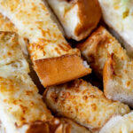 Cheesy garlic bread slices