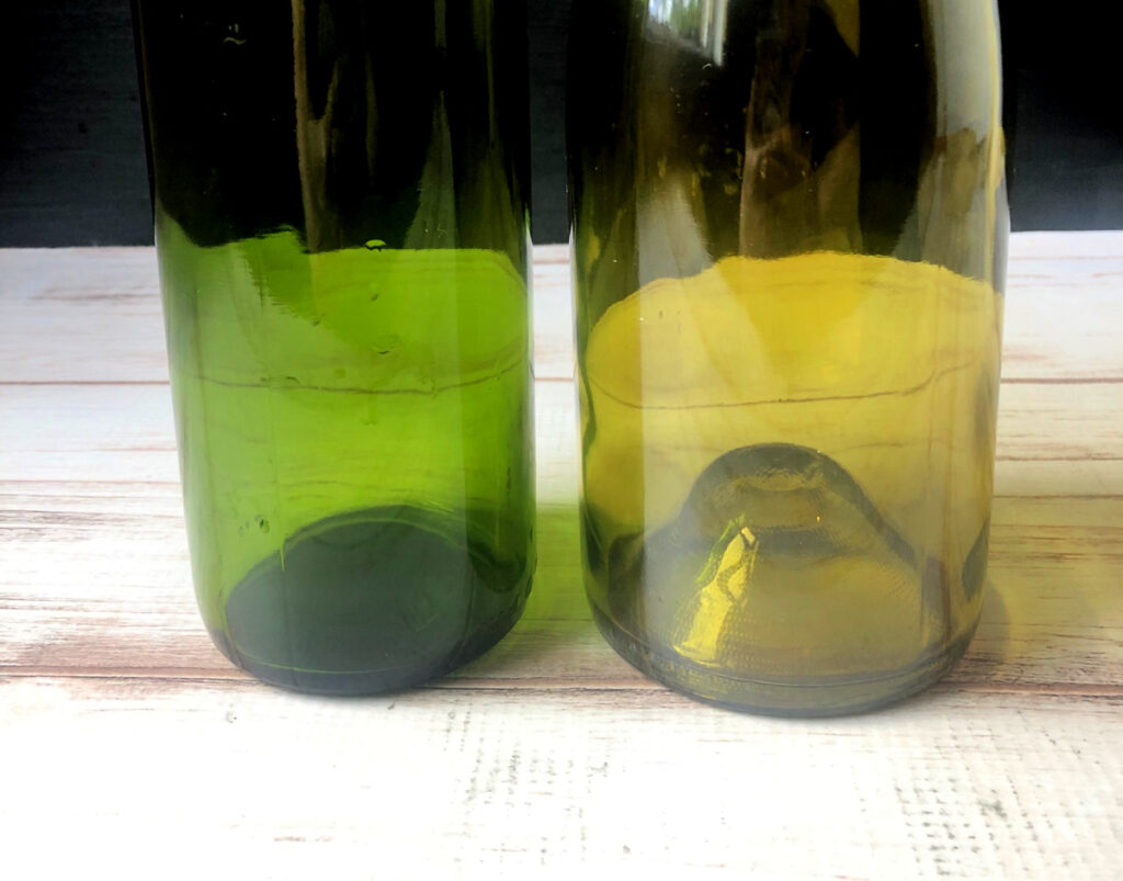Dark green and light green empty wine bottle.