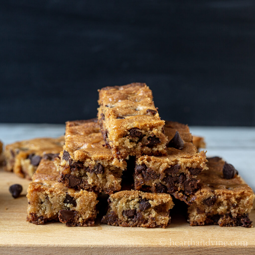 Stack of chocolate salted caramel blondie cookies.