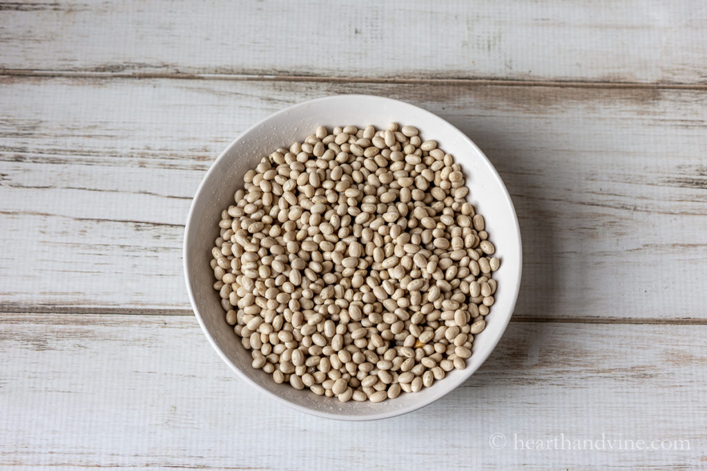 Dried navy beans in a bowl