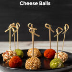 Mini cheese balls on a plate.