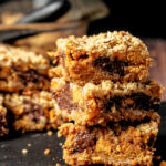 A trio of 7 layer bars stack on top of each other.