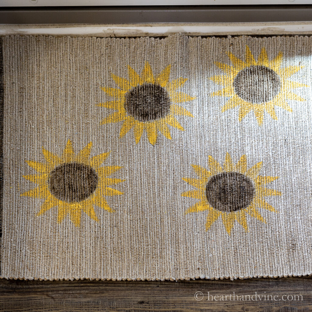 Handpainted sunflowers on a rug.