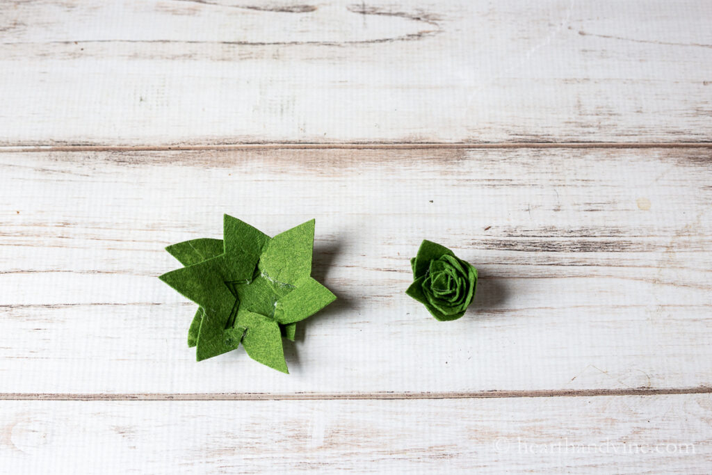 Two spiral cut pointed flower shapes rolled into two different flower shapes. One loose and one tight.