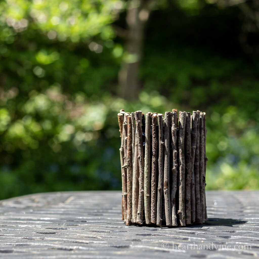 Small vase covered in twigs