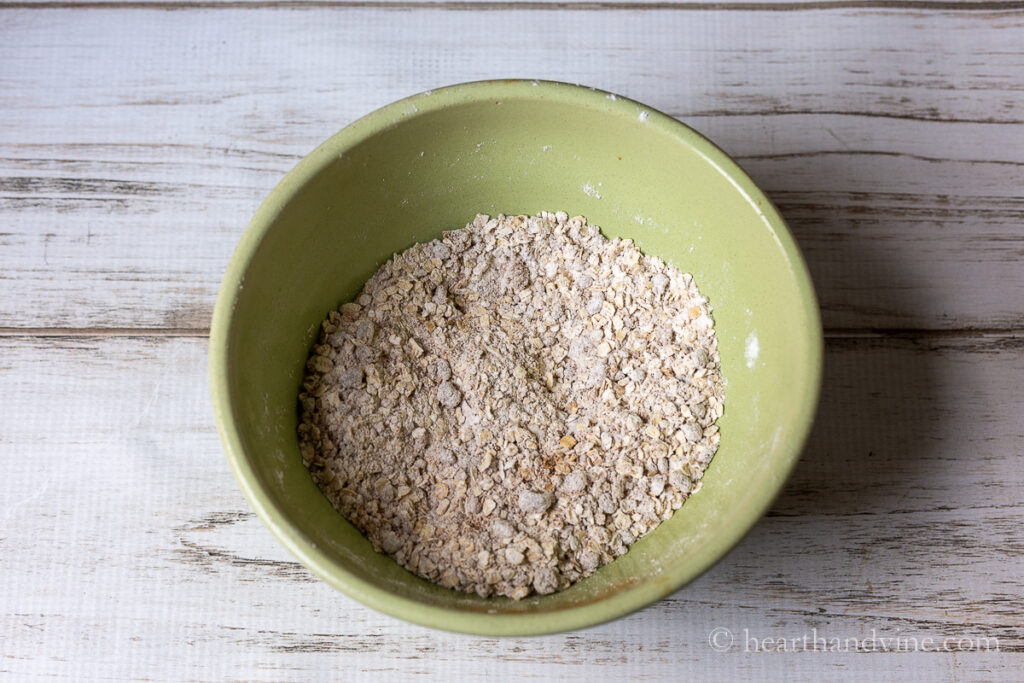 Oats, flour, sugar, cinnamon and salt in a bowl to make a crisp topping.