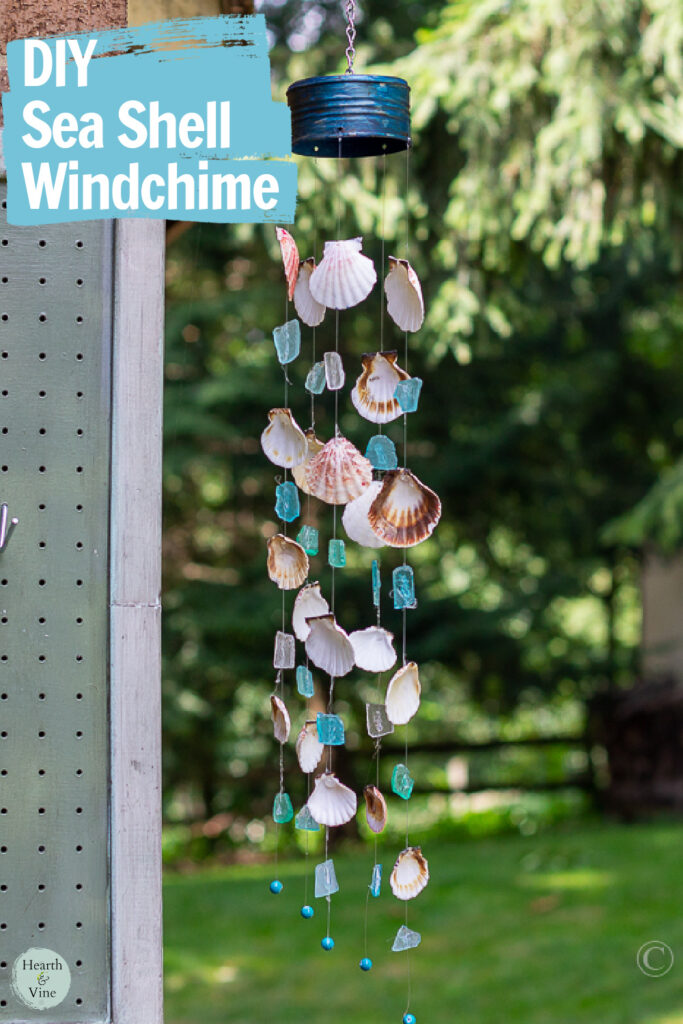 Seashell and Sea Glass wind chimes hanging outdoors.