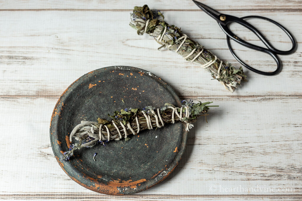 DIY smudge sticks, floral sheers and a clay plate.