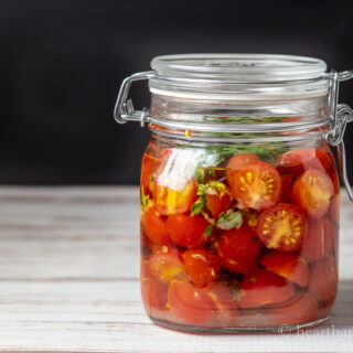 Jar of marinated tomatoes